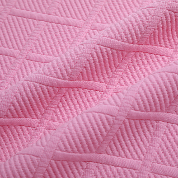 The manufacturer supplies all-polyester knitted jacquard elastic air layer knitted fabric, cotton-like polyester yarn weft dyed fabric