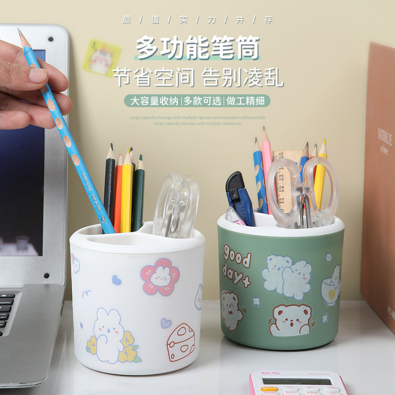 A cute cartoon girl's desktop with a large round capacity storage tube. Creative storage pen bucket for office student stationery