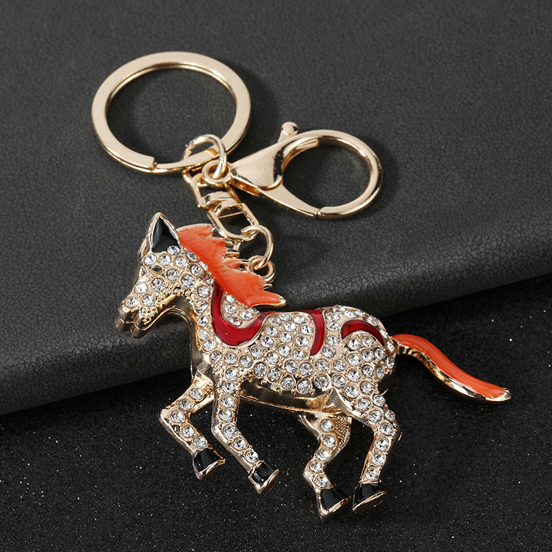 钥匙扣/钥匙扣公仔挂件/流沙入油玩具/挂饰/琥珀钥匙扣细节图