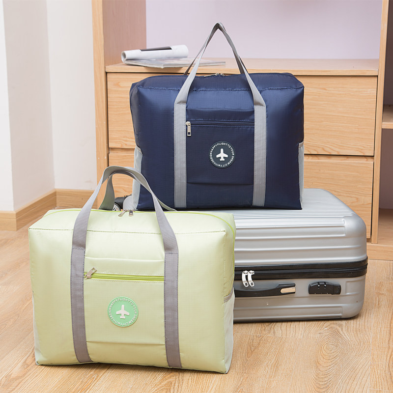 Thickened waterproof folding travel bag, portable clothing storage bag for men and women, carry-on luggage packing and storage bag for moving