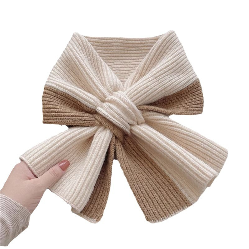 A short, cross-knitted scarf for women in autumn and winter, in Korean color, versatile and warm in winter. It's a neck protection for lazy people and is available for wholesale at popular street stalls Item Picture