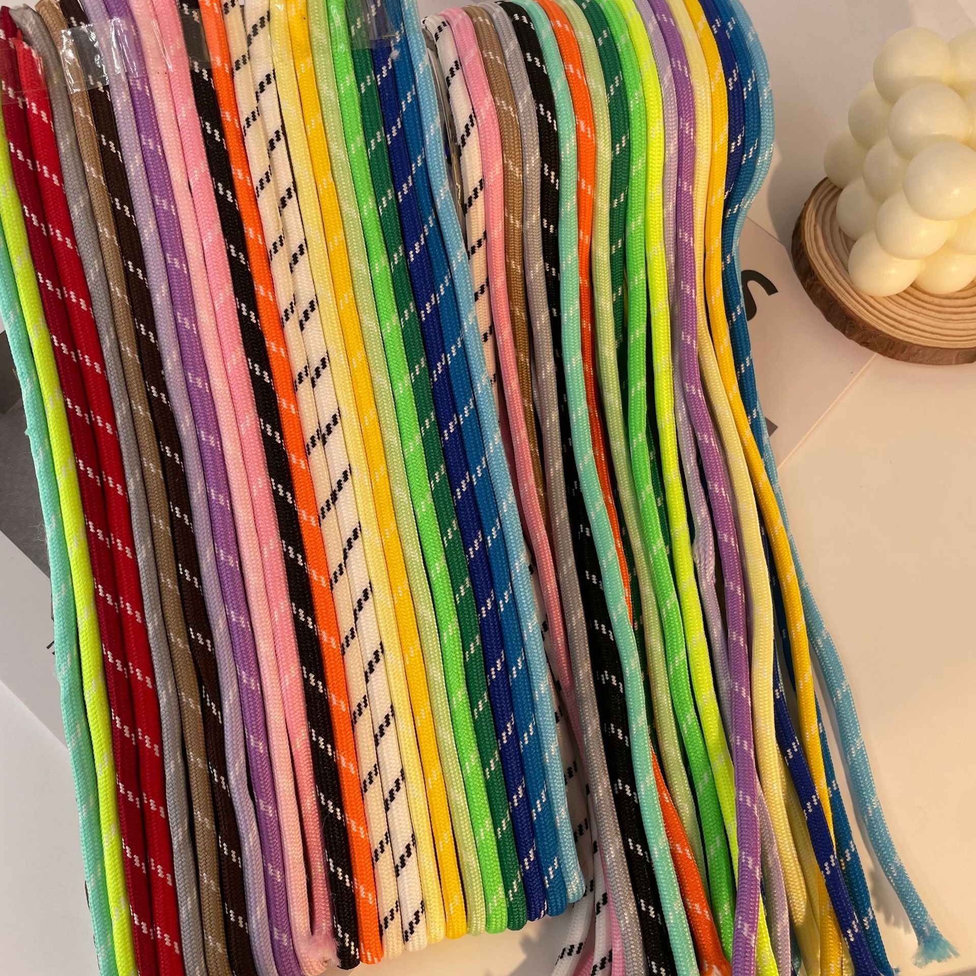 Wholesale and in-stock 5MM colored dotted polyester low-elasticity filament DIY hand-woven rope, mobile phone lanyard, shoelace semi-finished products Specification image