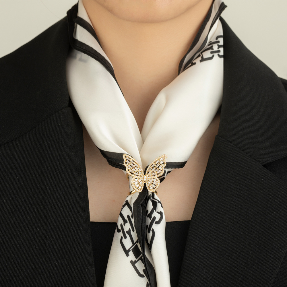 Fashionable and versatile hollowed-out butterfly silk scarf buckle, niche and light luxury style corner buckle, new trend multi-functional insect square scarf buckle Application Scenario