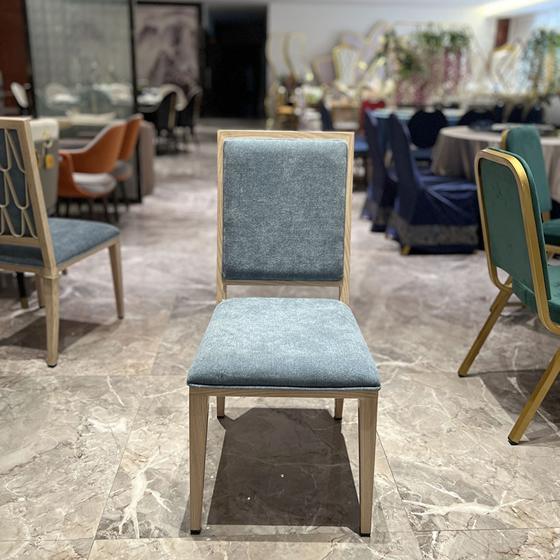 星辰工厂批发酒店宴会椅餐厅婚庆礼堂贵宾包房包厢贴木纹铝合金软包椅产品图