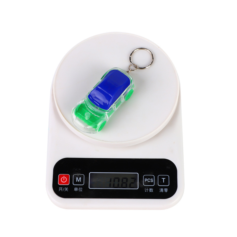 Creative simulation car cross-border illuminated plastic keychain pendant, LED illuminated car keychain, children's toy details Picture