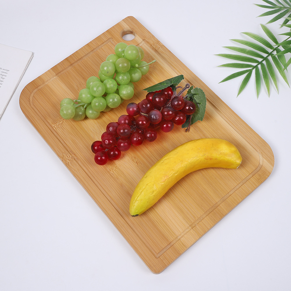 Cross-border solid wood cutting board, household kitchen bamboo and wood cutting board, multi-functional round hole handle cutting board, fruit cutting board details Picture