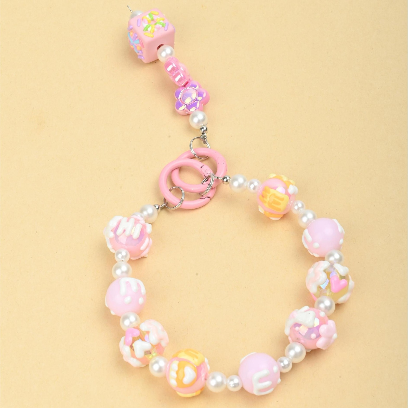 Hand-painted graffiti cartoon beaded chain phone case, double-lock pendant, keychain, bag accessory, trendy pendant for girls