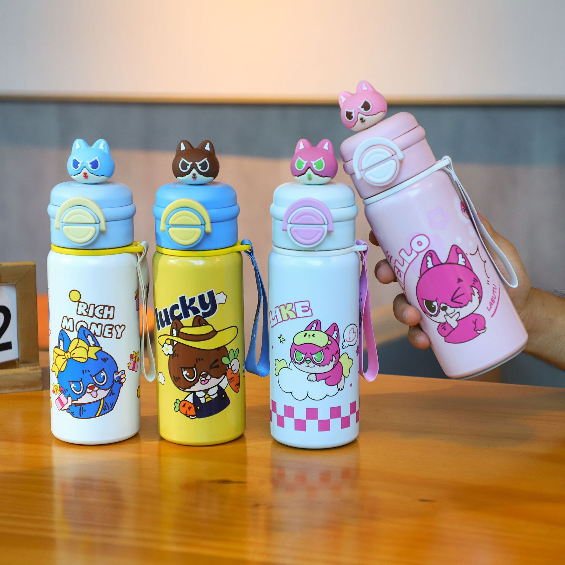 Wholesale of high-appeartion-level cartoon children's insulated cups, 316 stainless steel outdoor portable double drinking cup, jumping straw water cup details Picture