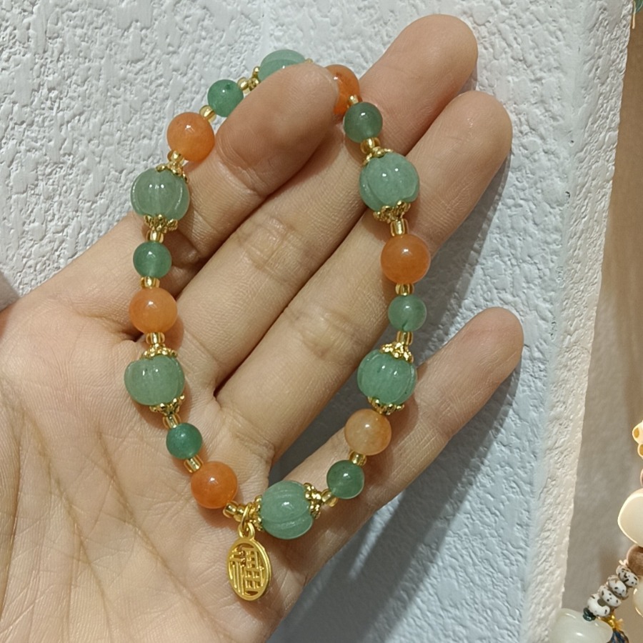High-end natural Xinjiang golden thread jade bracelet couple style, ethnic style pumpkin beads, bamboo joint hanging gourd, yellow jade hand Application Scenario