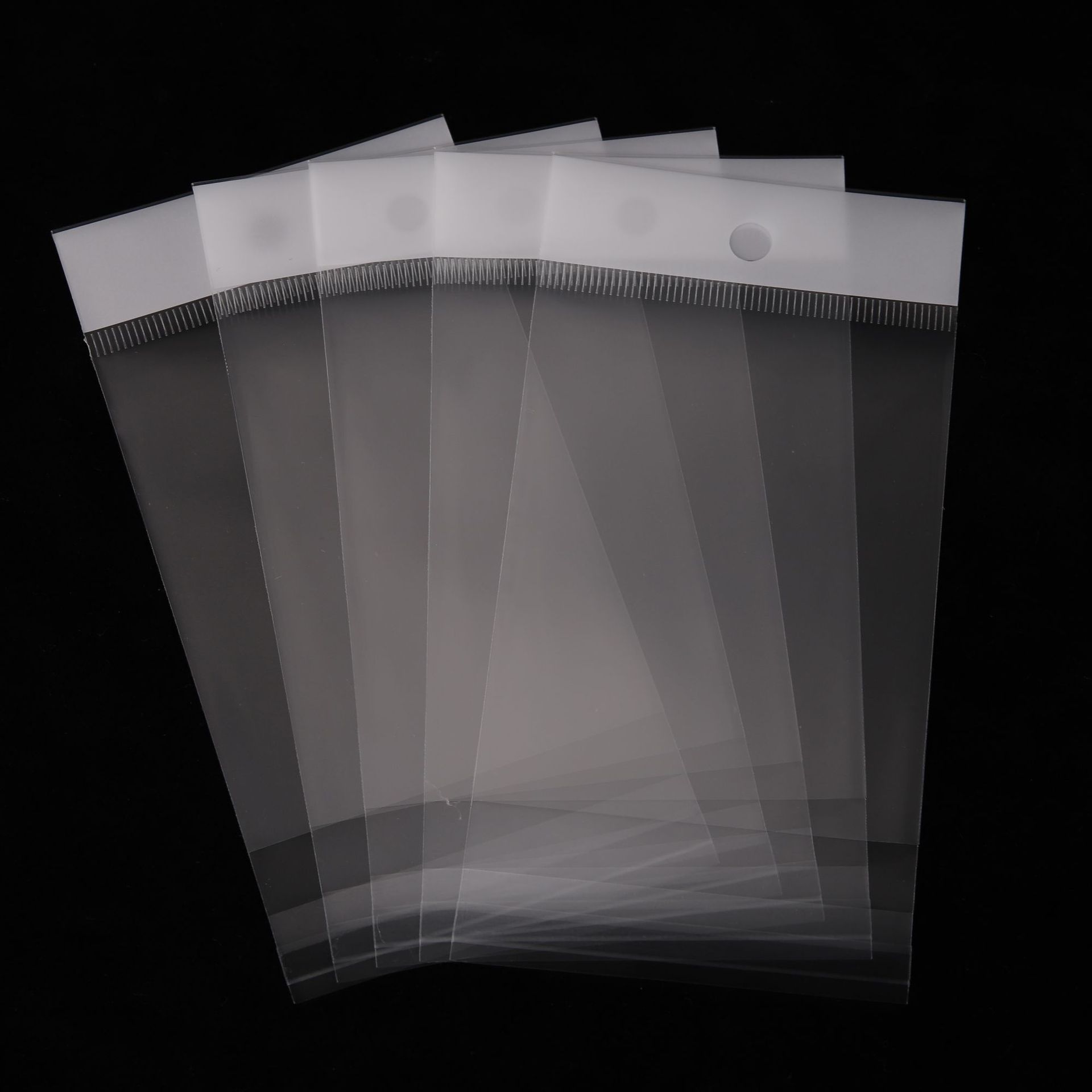 opp黏袋衣服透明带衣物卡头包装袋白色珠光膜塑料封口袋子加厚细节图