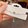 Summer's new cute cartoon diamond-encrusted four-leaf flower KT cat bracelet, stylish, light luxury and versatile pull-out accessory Specification image