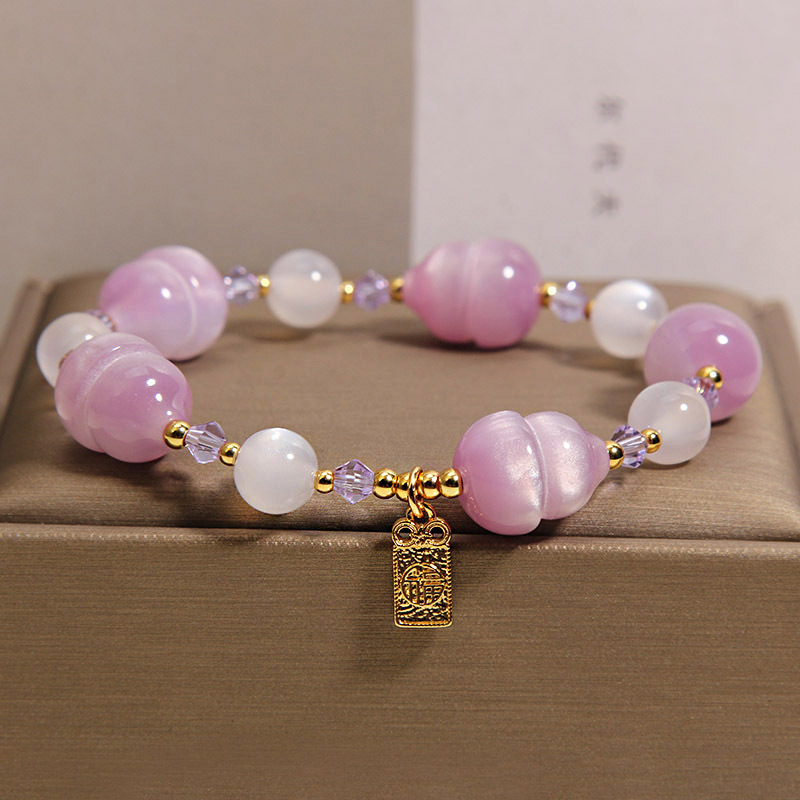 Nuevo estilo chino luz se convierte en rosa de melocotón calabaza pulsera de cristal para mujeres luz de lujo nicho alto sentido exquisito y versátil BFF mano cadena details Picture
