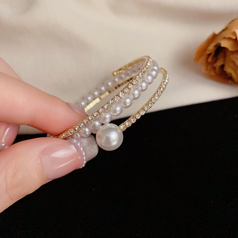 European and American Amazon personalized, fashionable, light luxury, versatile diamond-encrusted pearl elastic bracelet, gentle and elegant, design sense jewelry