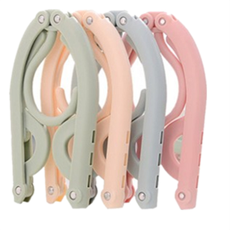 Wholesale of multi-functional magic travel folding clothes drying rack, portable children's storage plastic clothes rack, support and hanging rack Application Scenario
