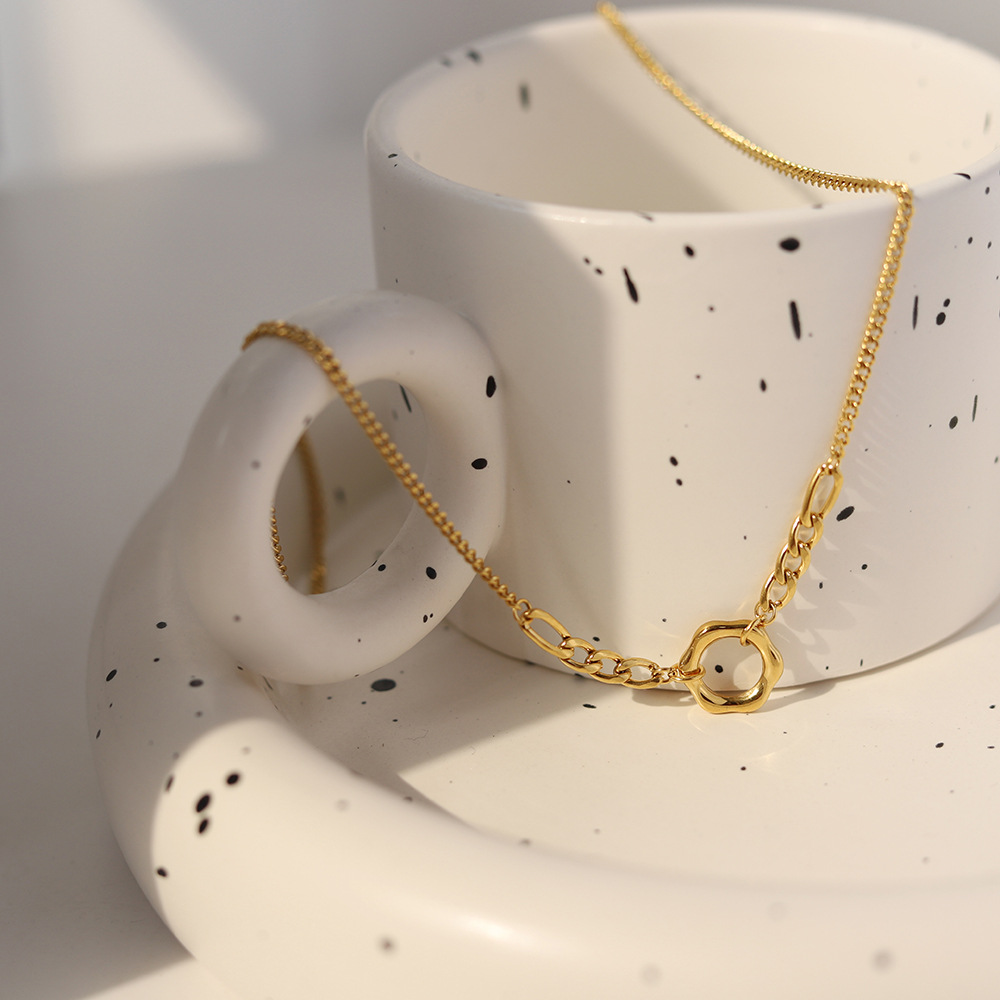 High-end, simple, light luxury, niche titanium steel chain hollowed-out circular necklace sweater chain, non-fading women's 2023 new style details Picture