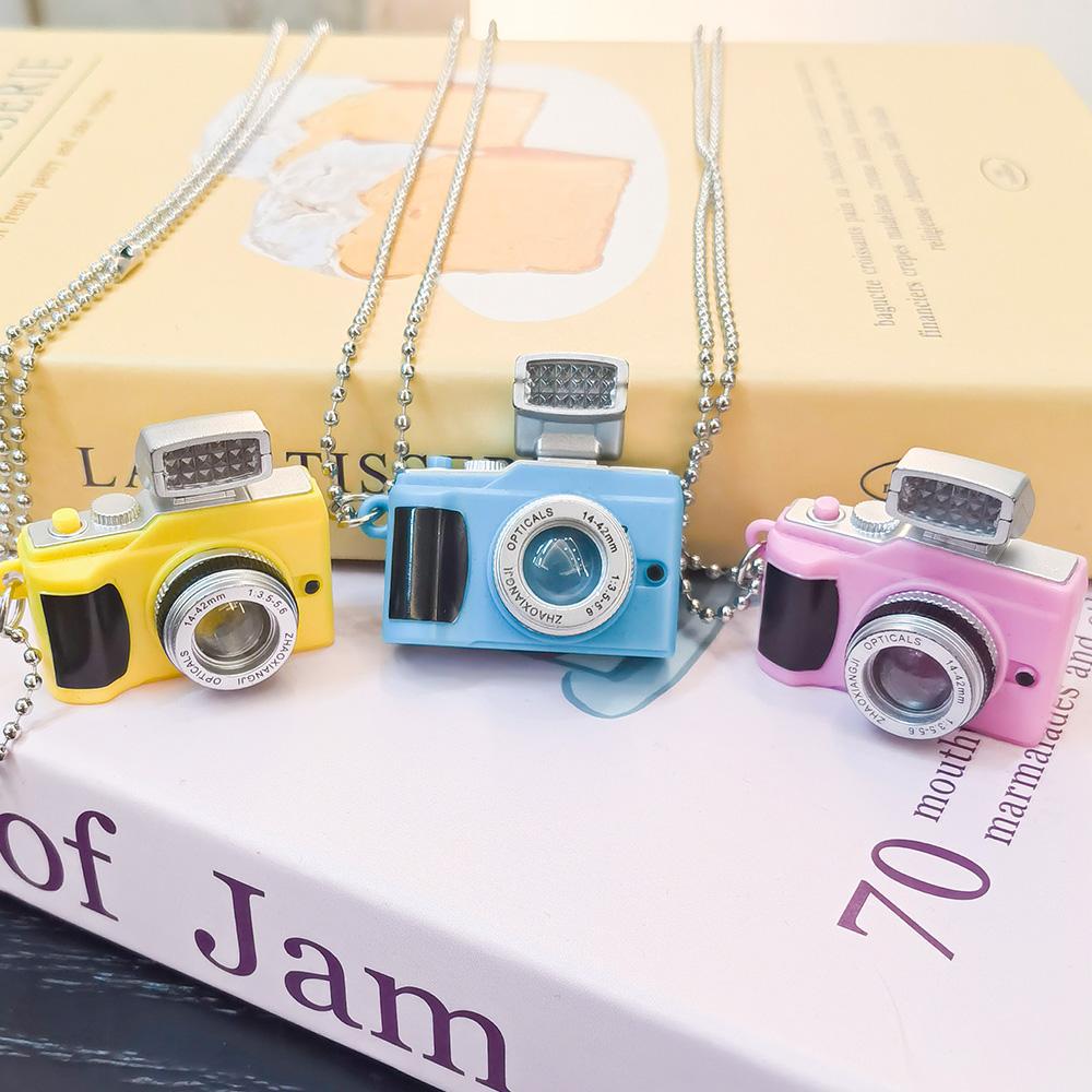 A popular light-emitting small camera with LED lights, a keychain that emits light, a camera necklace, a pendant, and a creative gift keychain Specification image