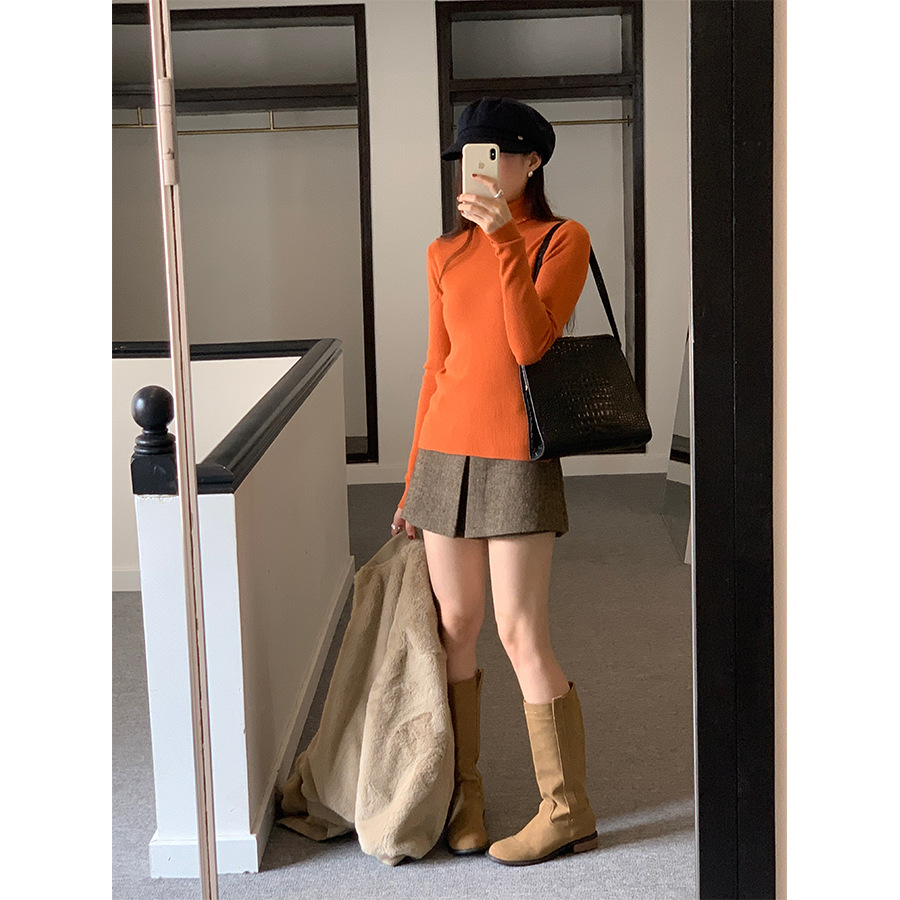 Huang Zheng's petite, high-quality, high-waisted skirt and pants for women in winter, Korean style, versatile and slimming, A-line body-hugging short skirt 541124 details Picture