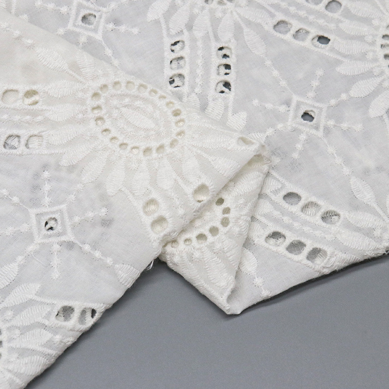 All-cotton embroidered fabric in stock, fashionable home textiles, children's wear, wedding gowns, evening gowns, halter straps, and lace fabric with hollowed-out patterns Application Scenario