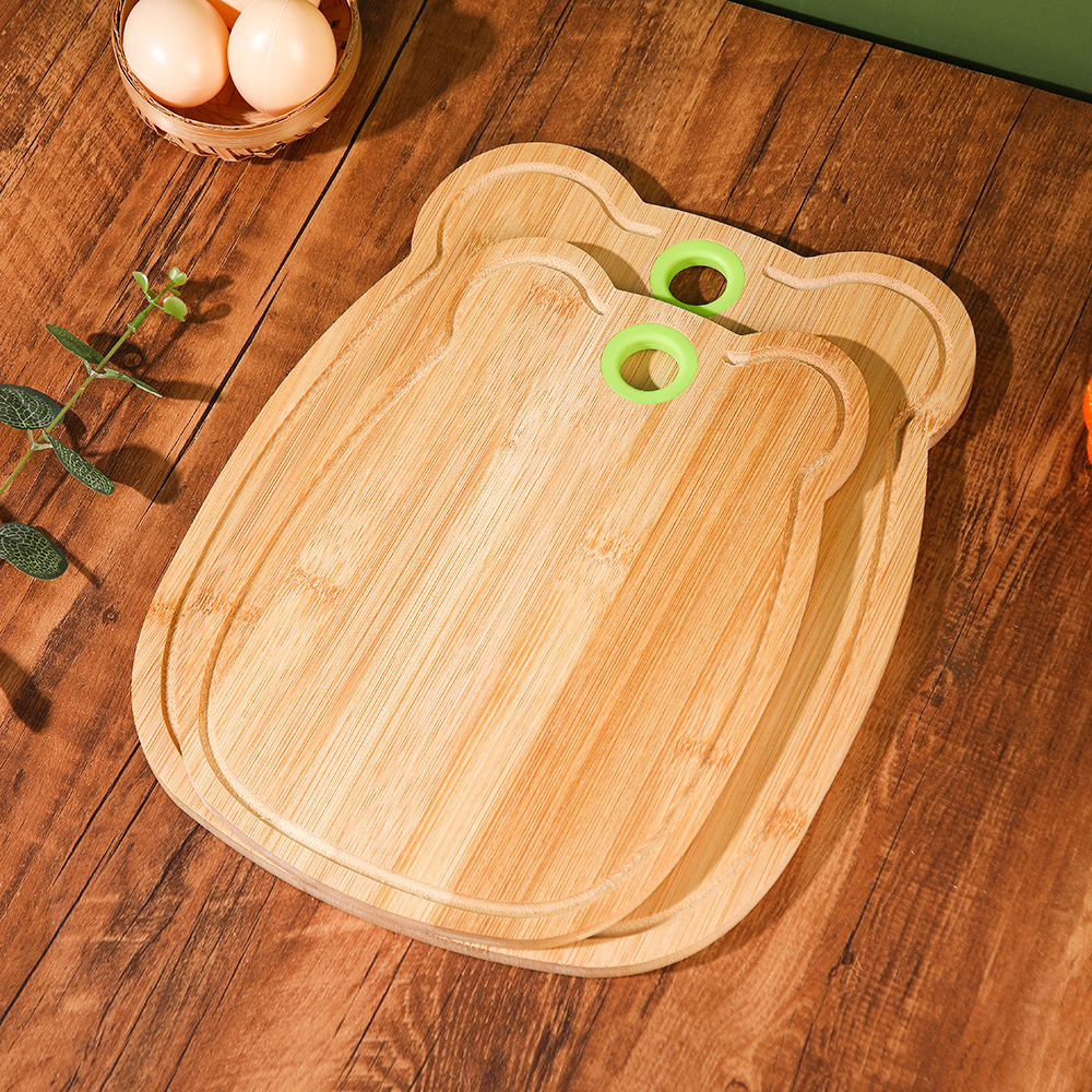 A 1cm household bear cutting board with antibacterial and anti-mold properties, thickened and easy to clean. Both sides can be used as kitchen perforated cutting boards