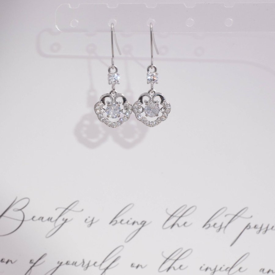 New copper-plated real gold fashionable women's Korean style simple and individual zircon earrings set with zircon safety lock ear hooks full figure