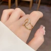 Wholesale of European and American cross-border design full-diamond cross-opening ring for women's unique, light luxury, versatile and super dazzling index finger ring accessories Specification image