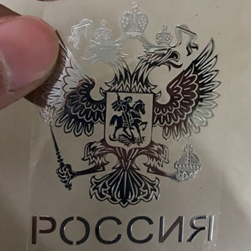 A Russian car with a shield-shaped coat of arms, a nickel metal Russian text sticker with the Federal Eagle logo A299 Application Scenario