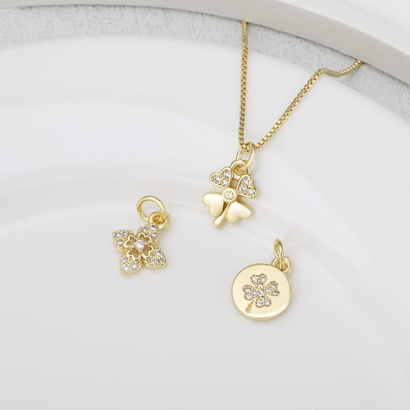 Wholesale and direct sales of popular copper-inlaid zircon four-leaf clover pendants, necklaces, bracelets and collarbone chains from Europe and America Specification image
