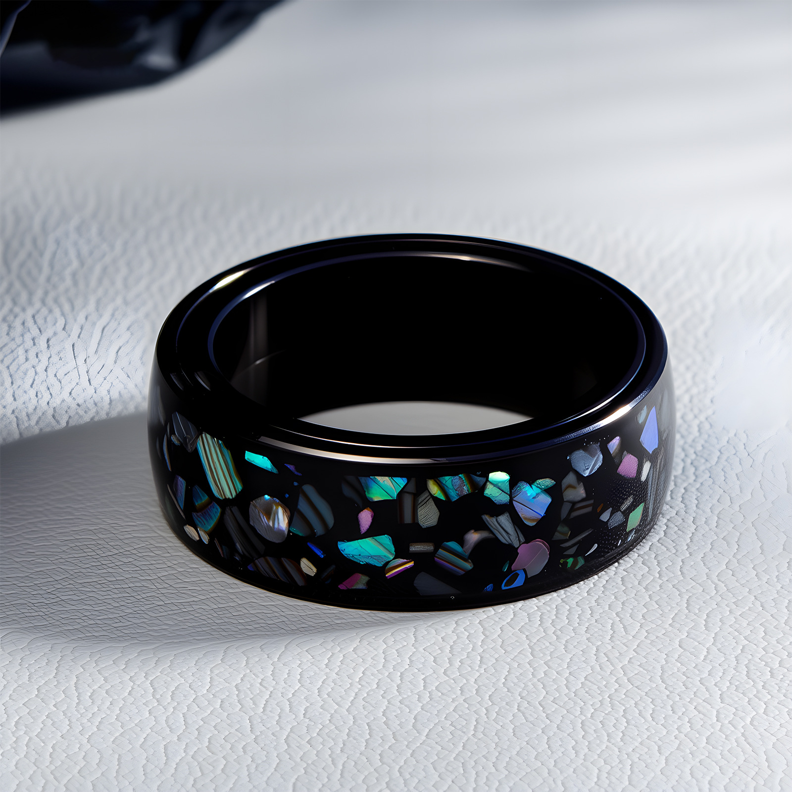 A new cross-border European and American jewelry item is selling well on Amazon. It's an 8MM titanium steel men's ring set with abalone shells and rotatable design Specification image