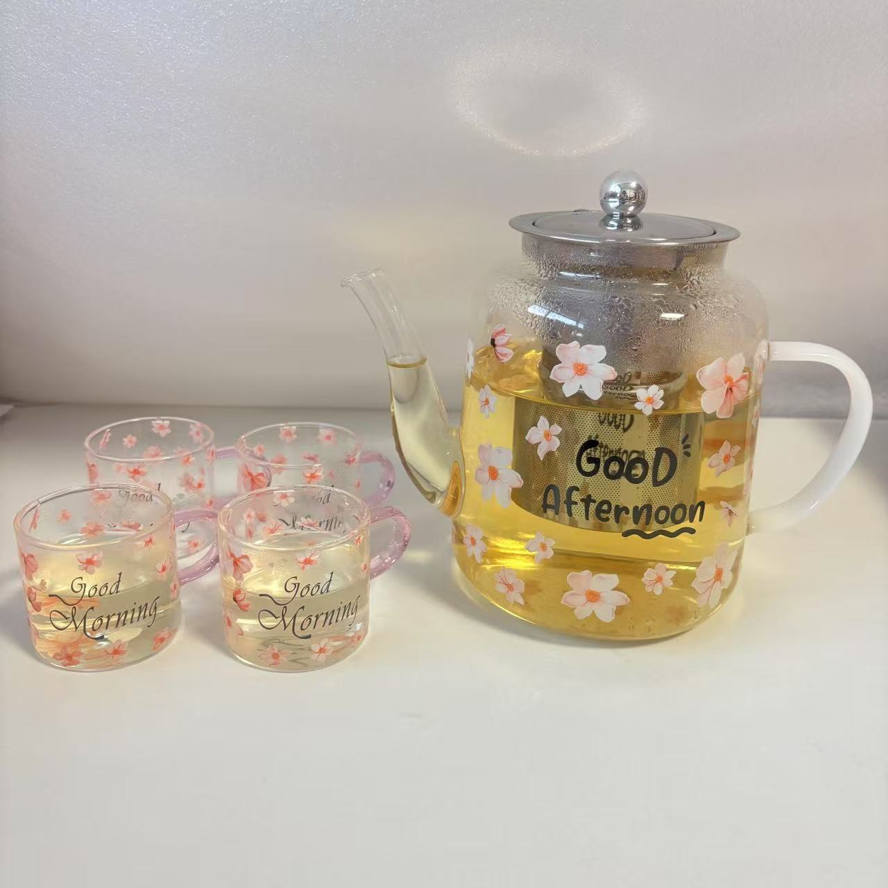 High borosilicate glass printed teapot, high-temperature resistant electric ceramic stove heating decal cup, tea and water separation flower teapot