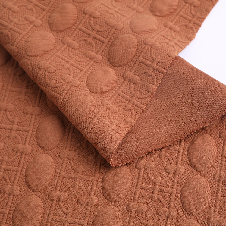 厂家供应 针织面料弹力染色棉感涤纱 纬编针织提花空气层婴童面料