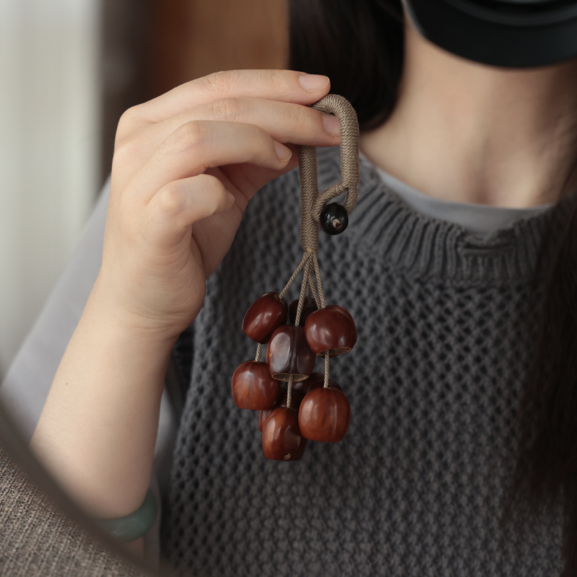 Fruit shell bell sound beam wind chime fruit hand bell string accompaniment meditation sound therapy instrument hand bell ethnic style manufacturer details Picture