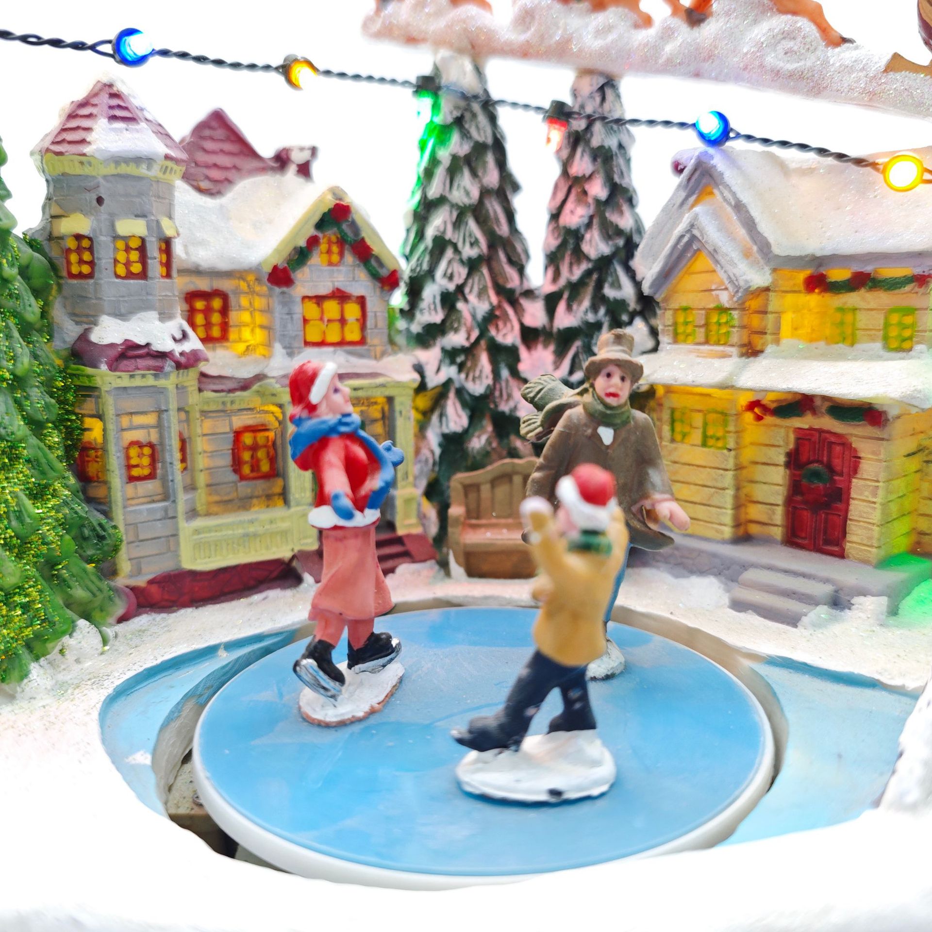 Cross-border Christmas gifts, glowing music, house ornaments, Christmas trees, skating scenes, Santa Claus, flying deer decorations Application Scenario
