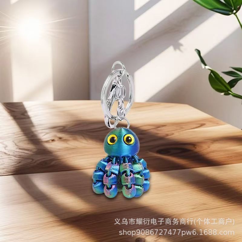 钥匙扣/卡通钥匙扣挂件/钥匙扣公仔挂件/流沙入油玩具/宋锦产品图