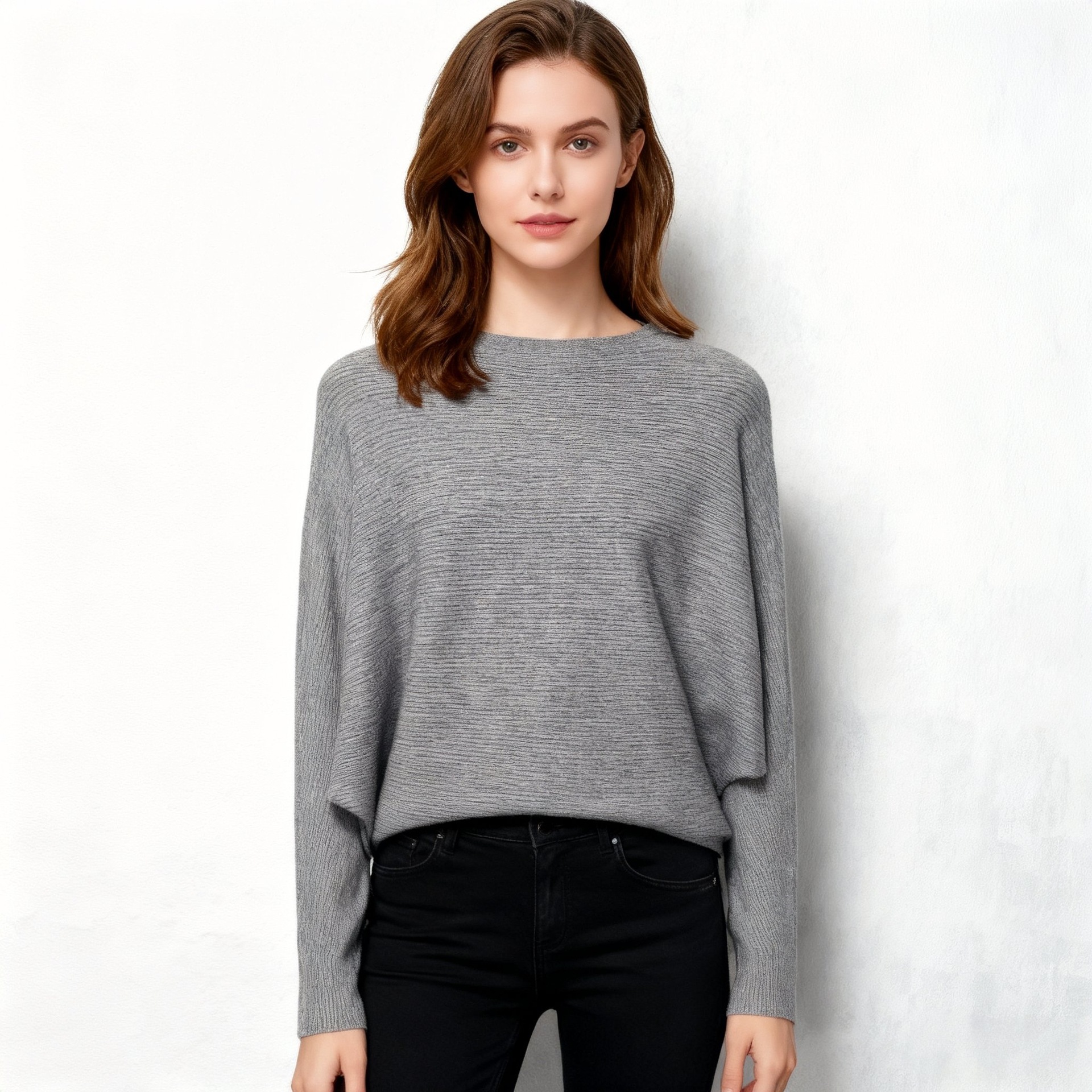 A loose knitted sweater with a one-shoulder collar and bat sleeves in stock. It's a great recommendation for women. You can come and buy it Specification image
