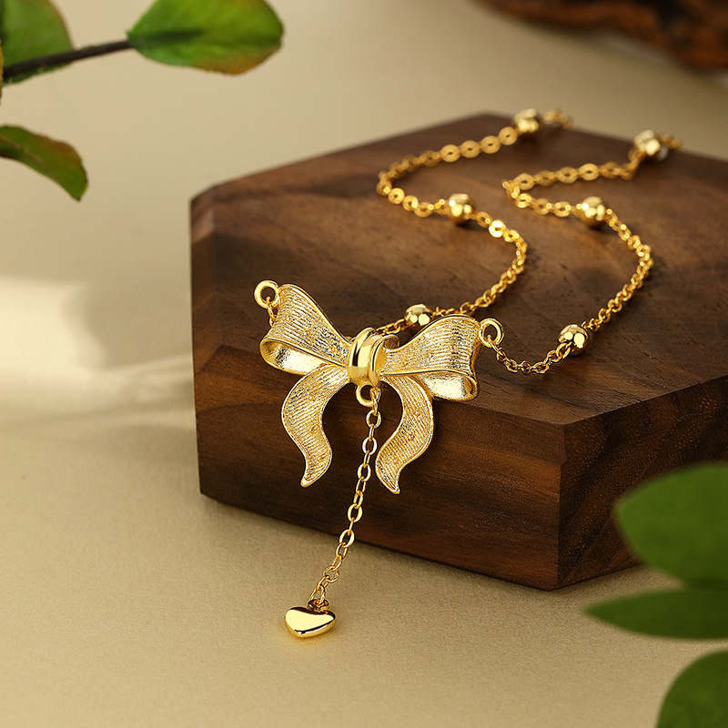 黄铜镀金在逃公主蝴蝶结项链爱心流苏银色套链同款厂甜美韩版项链