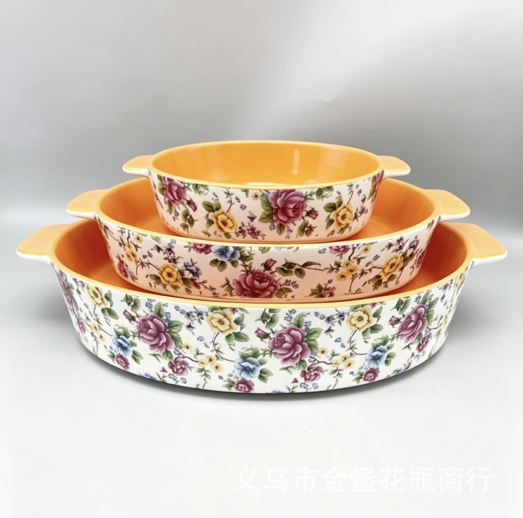 A three-piece set of Korean-style retro floral ceramic baking bowls with yellow, orange and pink multi-color inner baking trays as gifts for homestays and hotels