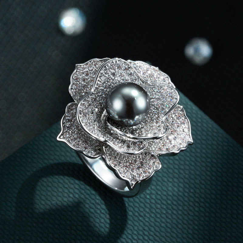 A light luxury and high-end grey pearl camellia open ring, a copper alloy slightly inlaid zircon adjustable index finger ring