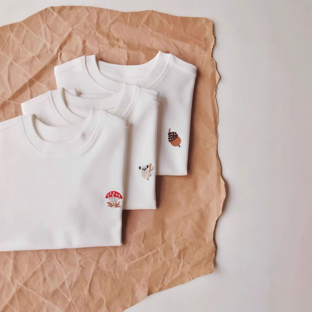 儿童白色短袖t恤2025新款宝宝棉半袖落肩体恤圆领宽松刺绣上衣夏