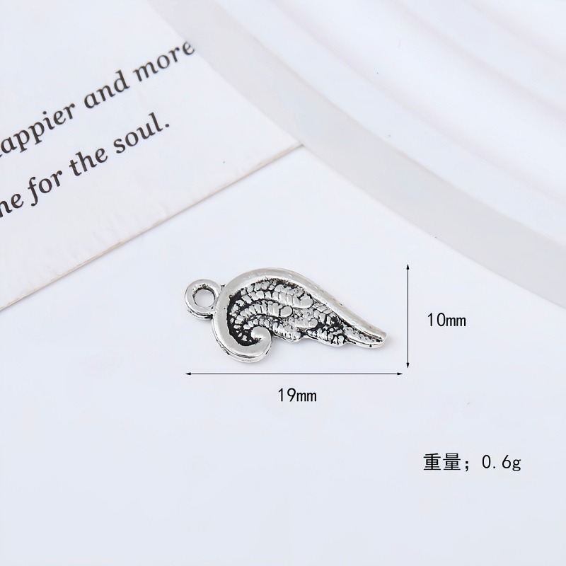 Personalized retro leaf wing metal pendant, trendy hip-hop necklace pendant, diy bag, keychain Specification image