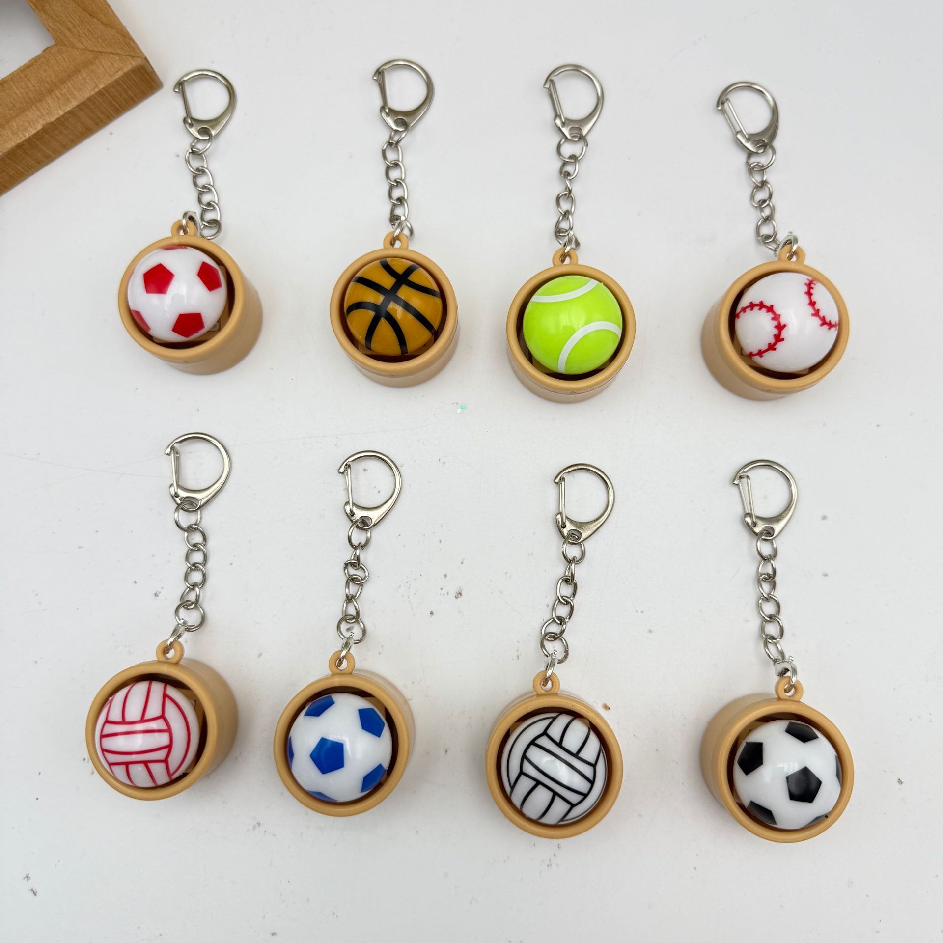Cross-border stress-relieving buttons, football, basketball buns, softball, tennis, volleyball, stress-relieving buttons, toys, keychains Application Scenario