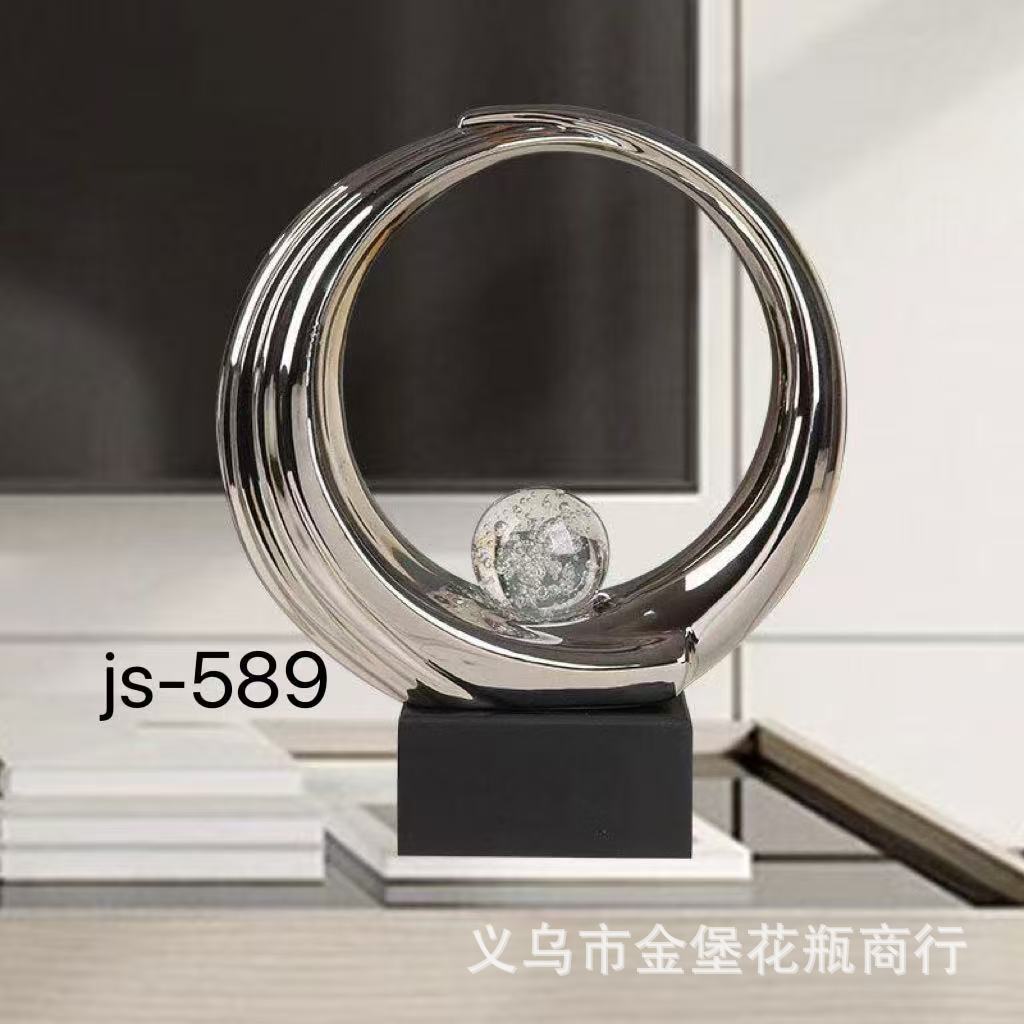 A light luxury heart-shaped ceramic decorative piece with a hollowed-out heart shape and a hand-held crystal ball, a romantic decoration technique for the wedding room and living room Specification image