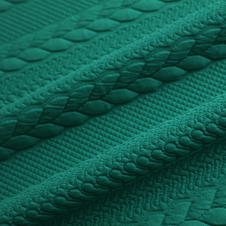 The manufacturer supplies knitted elastic jacquard air layer fabric for children's clothing, including weft knitted cotton-polyester yarn details Picture