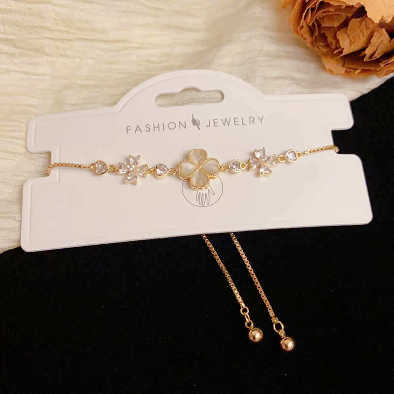 Summer new light luxury diamond-encrusted four-leaf flower bracelet, pull-out style, fashionable, gentle, versatile and high-end accessory for women details Picture
