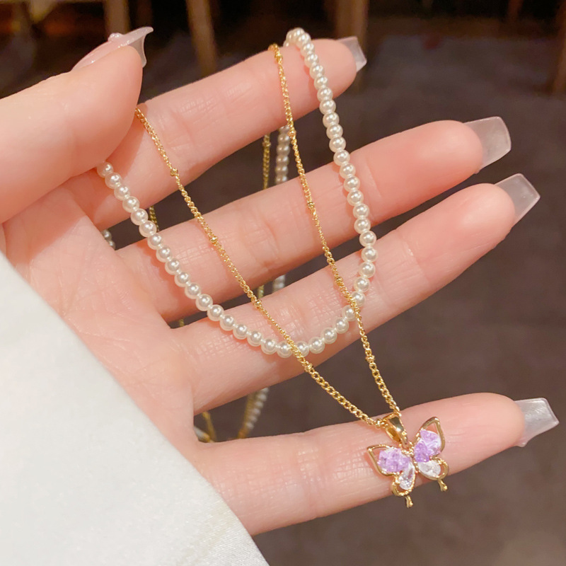A fresh and fashionable, versatile double-layer glass bead butterfly pendant necklace, light luxury, simple and versatile, with a high-end feel for women Application Scenario