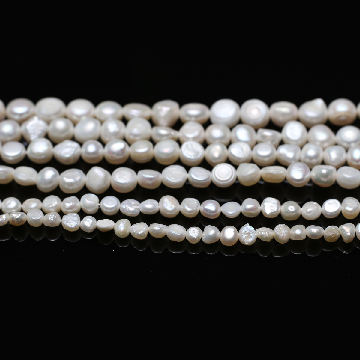 High-quality 4-5mm double-sided glossy natural freshwater pearl scattered beads in the shape of rice semi-finished diy jewelry accessories batch Item Picture