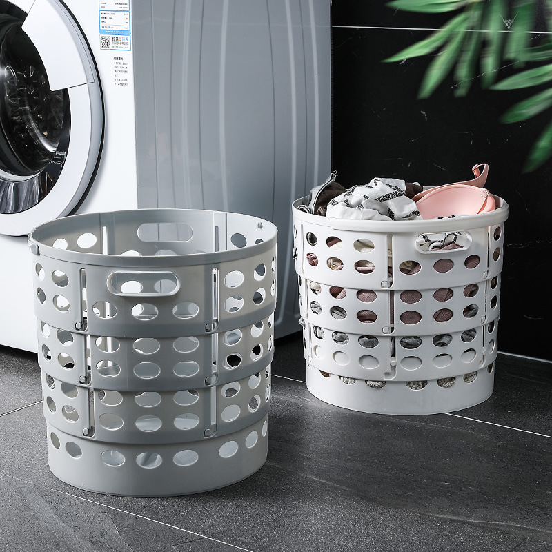 The dirty clothes basket can be hung in the home bathroom to store dirty clothes. It is a zoned storage basket and a wall-mounted dirty clothes basket in the bathroom