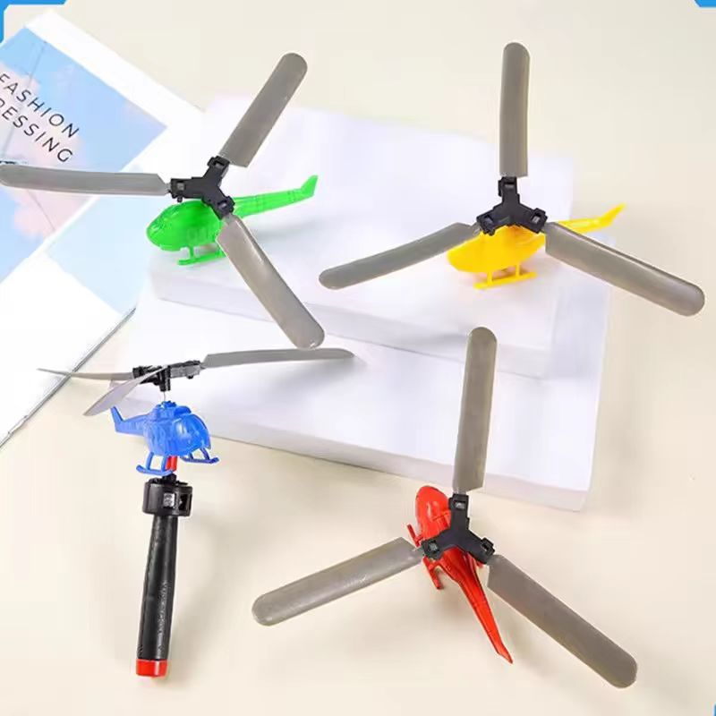 Handle-pulled power helicopter, handheld aircraft, outdoor drawstring, bamboo dragonfly, children's 8090 nostalgic small toy Application Scenario