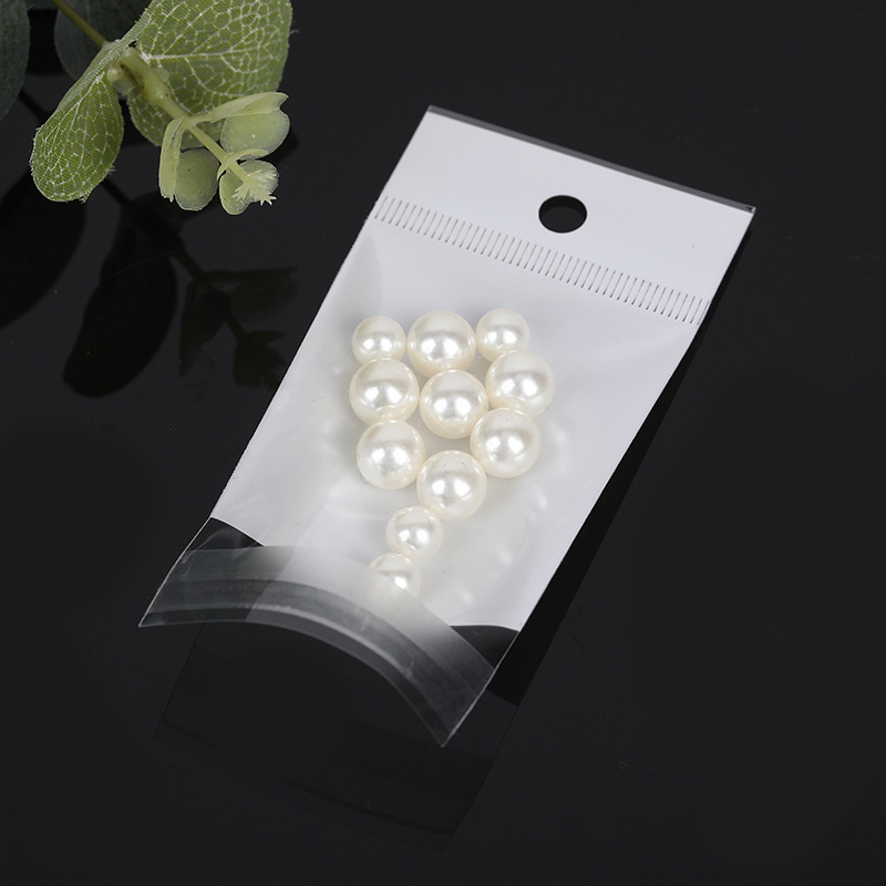 现货透明不干胶内膜卡头自粘袋opp珠光袋饰品塑料包装封口挂孔袋细节图