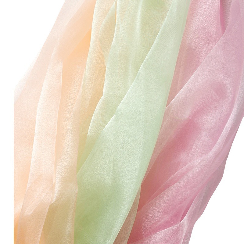 现货三根纱闪光欧根纱硬纱舞台布料服装面料纯色透明纱婚庆装饰白底实物图