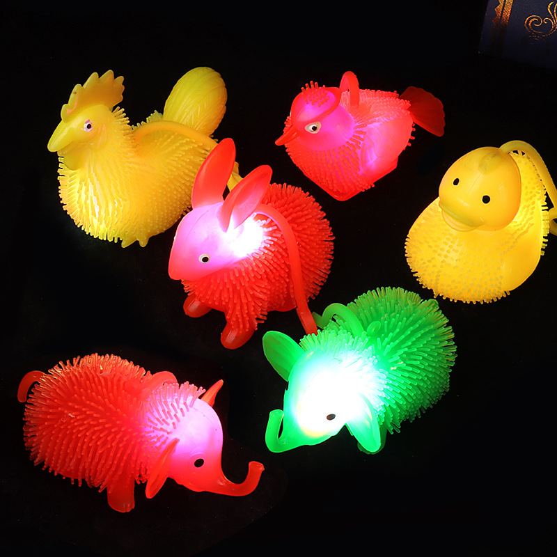 The glowing rabbit is pinched, the flashing duck, the rooster, the elephant, the thrush, and the fluffy ball are all children's toys for release. Wholesale details Picture
